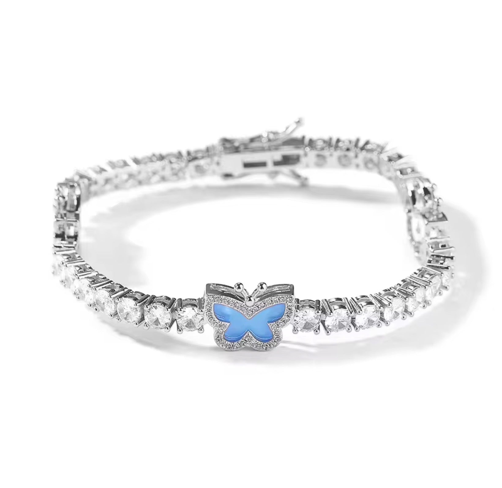Diamond butterfly tennis bracelet by LuxeLash Studio featuring sparkling diamond-studded butterfly charms on a delicate jewelry chain.