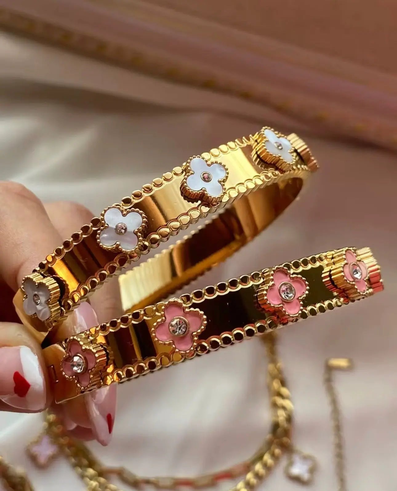 18k gold flower bangle bracelet from LuxeLash Studio featuring intricate floral design in elegant jewelry style.