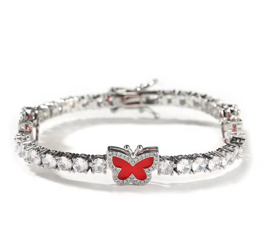 Diamond butterfly tennis bracelet by LuxeLash Studio featuring sparkling diamonds and delicate butterfly charms on a jewelry chain.