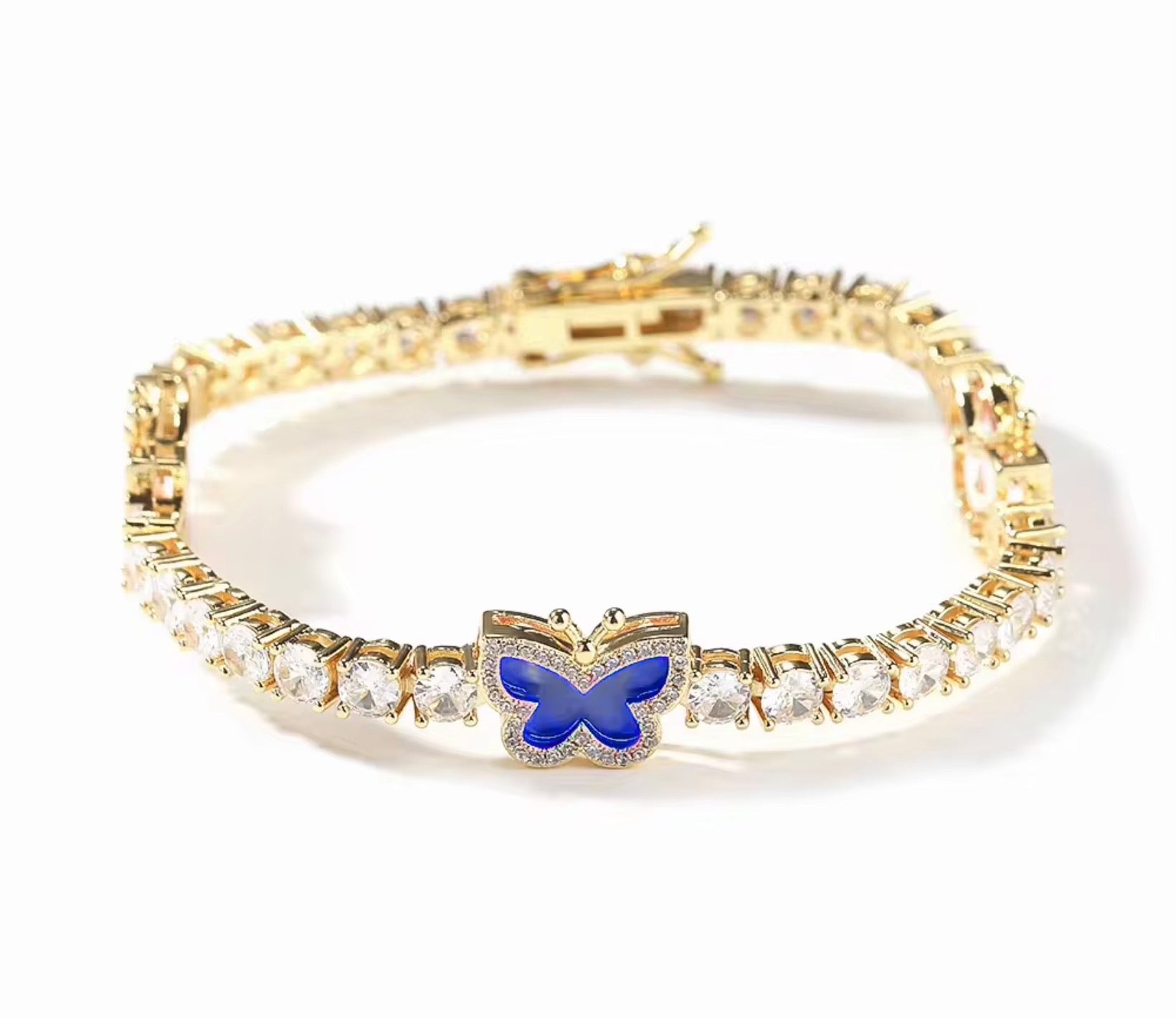 Diamond butterfly tennis bracelet by LuxeLash Studio featuring sparkling diamonds on a delicate jewelry piece.